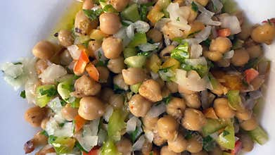 Mediterranean Chickpeas Salad with onion, pepper, tomato, oil, vinegar