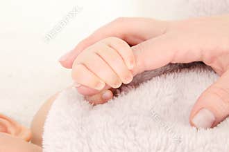 Parent and child holding hands