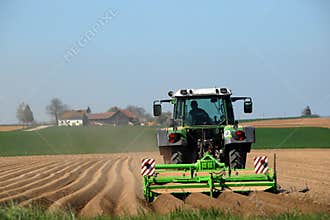 Farmer Tilling Field