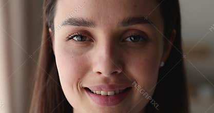 Closeup face beautiful woman having wide smile look at camera