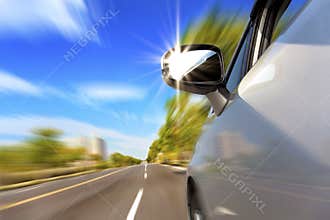 Car on the road with motion blur