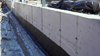 Pouring concreting Bituminous waterproofing of the concrete foundation.