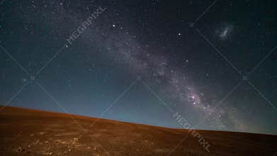 An amazing view of the Milky Way rising in Atacama Desert night sky while the Moon sets. An awe view of the stars and all the