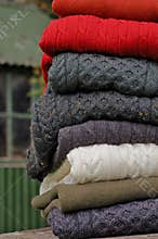 Men's Aran knit traditional jumpers outdoors