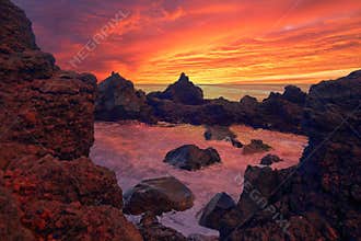 Rocky Pool by the Ocean in Azores at Sunset