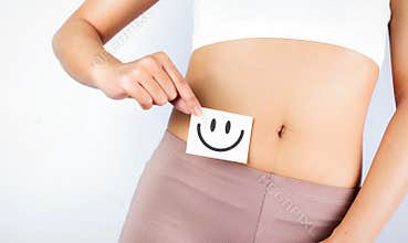 Fit Slim Body Holding White Card With Happy .Smiley Face In Hands Good Digestion Concepts