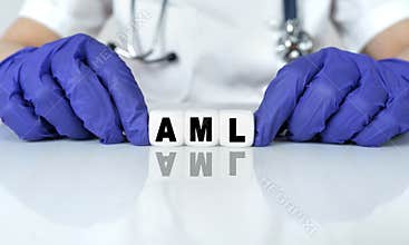 The doctor put together a word from cubes AML. Acute Myeloid Leukemia