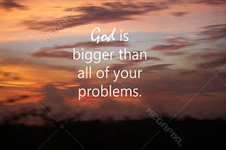 God is bigger than all of your problems. Spiritual inspirational words concept with text message on blurry sunset sky.