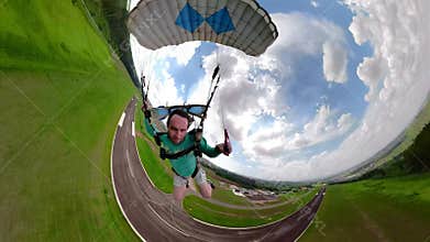 Unique images of a parachutist making selfie.