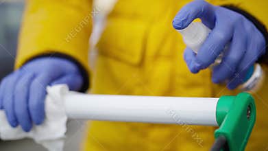 Detail video of disinfection of the shopping cart.
