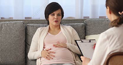 Pregnant woman having a obstetrician doctor appointment