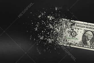 Inflation, dollar hyperinflation with black background. One dollar bill is sprayed in the hand of a man on a black