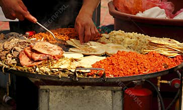 Tacos and tortas, typical mexican food present in all celebrations. I