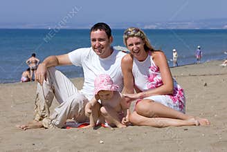 Young attractive family on vacation in Spain