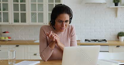 Woman counsellor in headset use laptop provide assistance by videocall