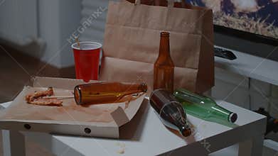 Dirty home of alone person with sever depresion having trash on messy table