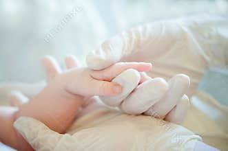 A helping hand to little baby in hospital