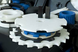 Plastic machine parts.