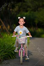 Happy Chinese girl biking
