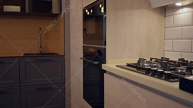 Modern expensive household appliances in furniture store showroom. Interiors of luxurious shop with furniture and