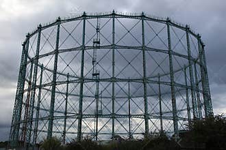 Metal Gas Holder Structure on Cloud Background