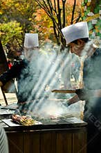Chefs making grill BBQ food in autumn, Nami Island South korea