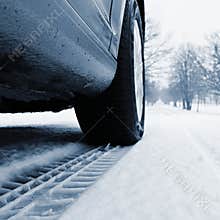 Car tire track in the snow. Concept for transport and winter tires in winter time