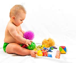 Baby and Pile of Toys