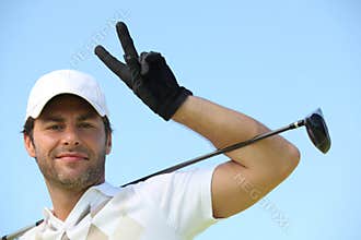 Man playing golf