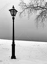 Black street lamp in winter, Canada