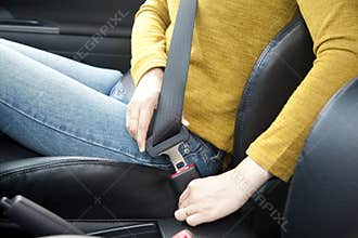 Fastening a seat belt