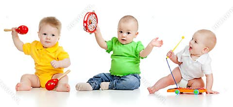 Children playing with musical toys