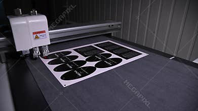 PPYATIGORSK, RUSSIA - OCTOBER 5, 2021: Printer Exhibition. Digital flatbed cutter, plotter cutting label stickers