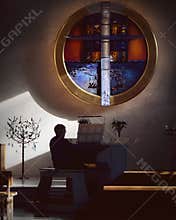 Organist playing in church.
