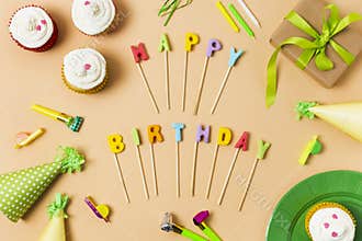 happy birthday lettering orange background. High quality photo