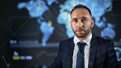 Portrait bearded business man talking leading breaking news at studio futuristic global map screen