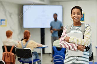 Smiling Teenage Girl in School