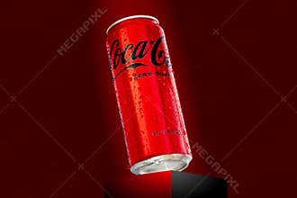 330ml can of Coca-Cola zero with water droplets on red background. Coca-Cola Classic. Estonia, Tallinn, May, 2022