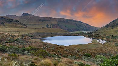 The majestic black lagoon in the snowy park where the Nevado del Ruiz,
