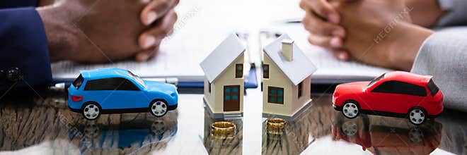 Wife And Husband Splitting House And Car