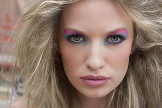 Blond woman with dramatic eyes