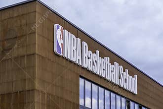 Vilnius, Lithuania - June 1, 2022: NBA Basketball School logo on building wall