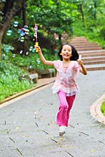 Girl playing bubble