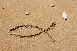 Christianity fish sign in sand