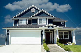 New Home House Blue Exterior Dramatic Blue Sky Background
