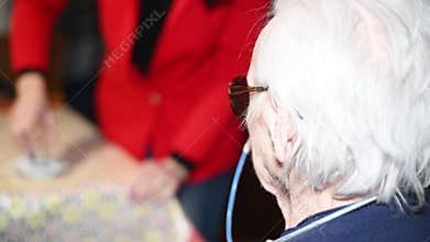 Creating medical pill powder from elderly woman with nasogastric intubation