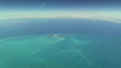 Flying over The Bahamas. Beautiful ocean colors. Actual aerial footage