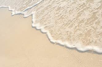 Waves on Shore of White Sand Beach