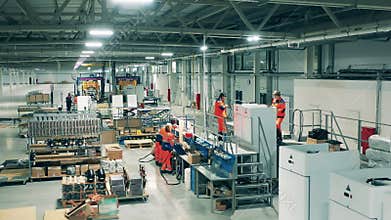 Industrial production factory interior. Refrigeration factory unit with manual assembly of fridges