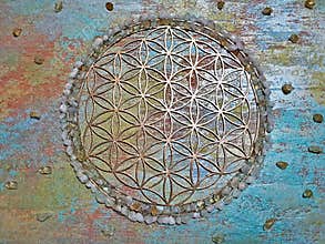 Flower of life laser cut on rainbow painted wall